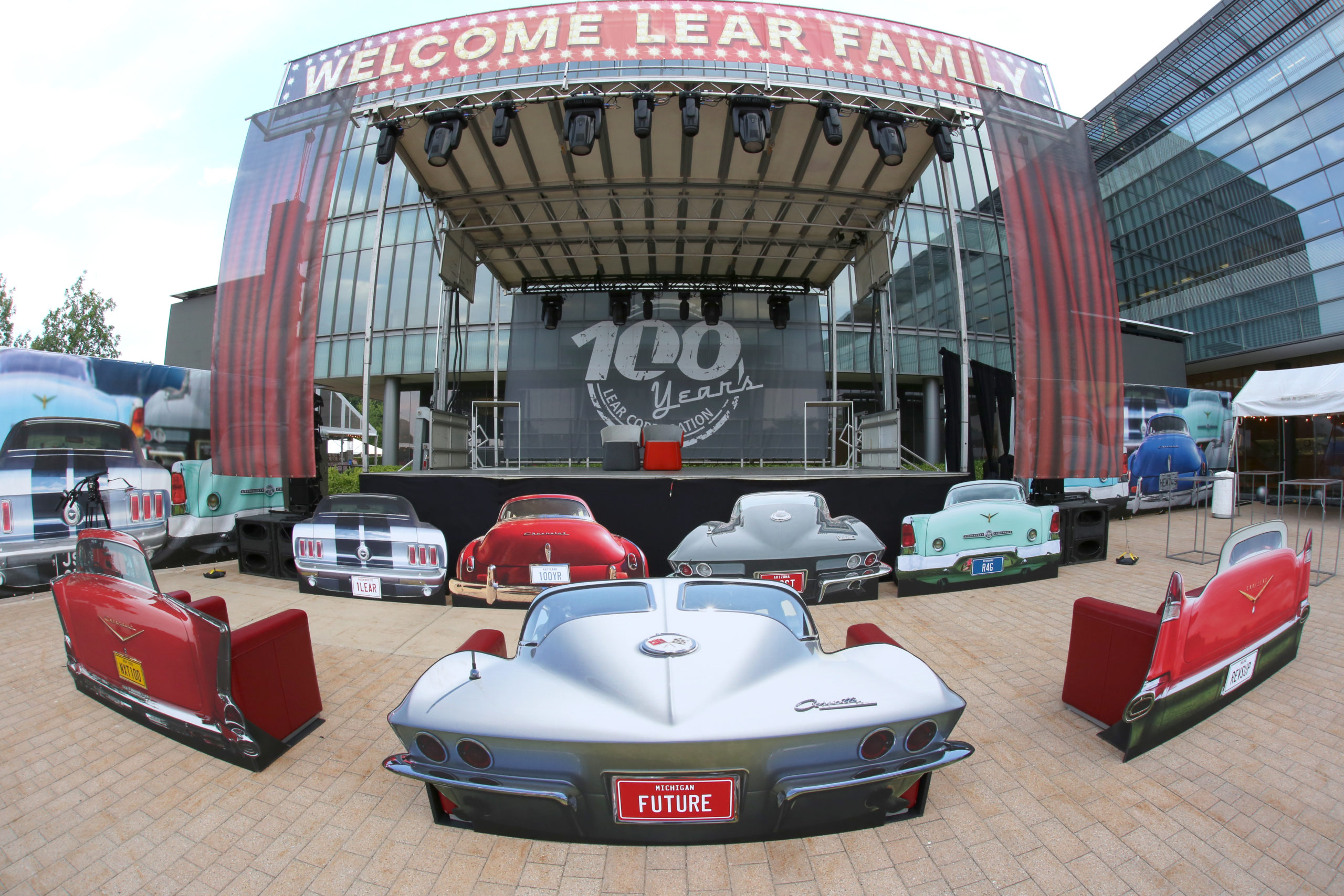 Outdoor drive-up themed event furniture outside corporate headquarters