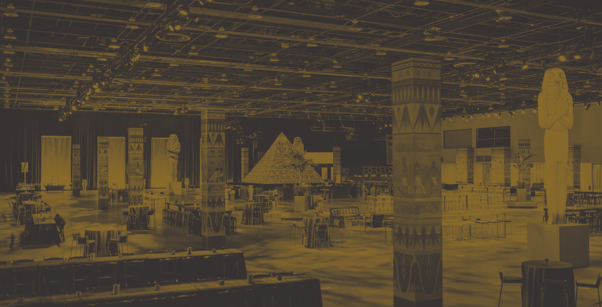Landscape brand page header image shows a Display Group event with ancient Egypt themed installations behind a duotone brown overlay treatment.