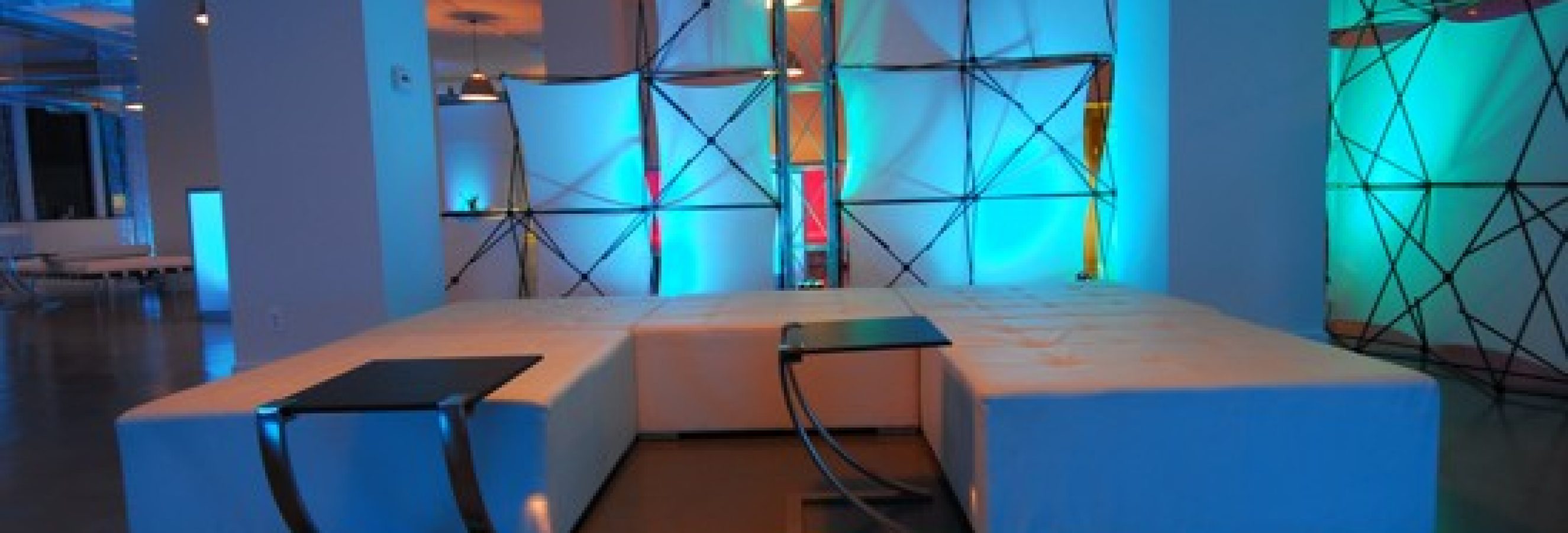 White-Ottoman-Pod-With-Nomadic-Spandex-Wall-Units White-Ottoman-Pod-With-Nomadic-Spandex-Wall-Units